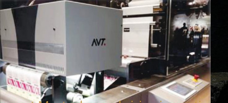 An automatic vision inspection system reading a printed label web